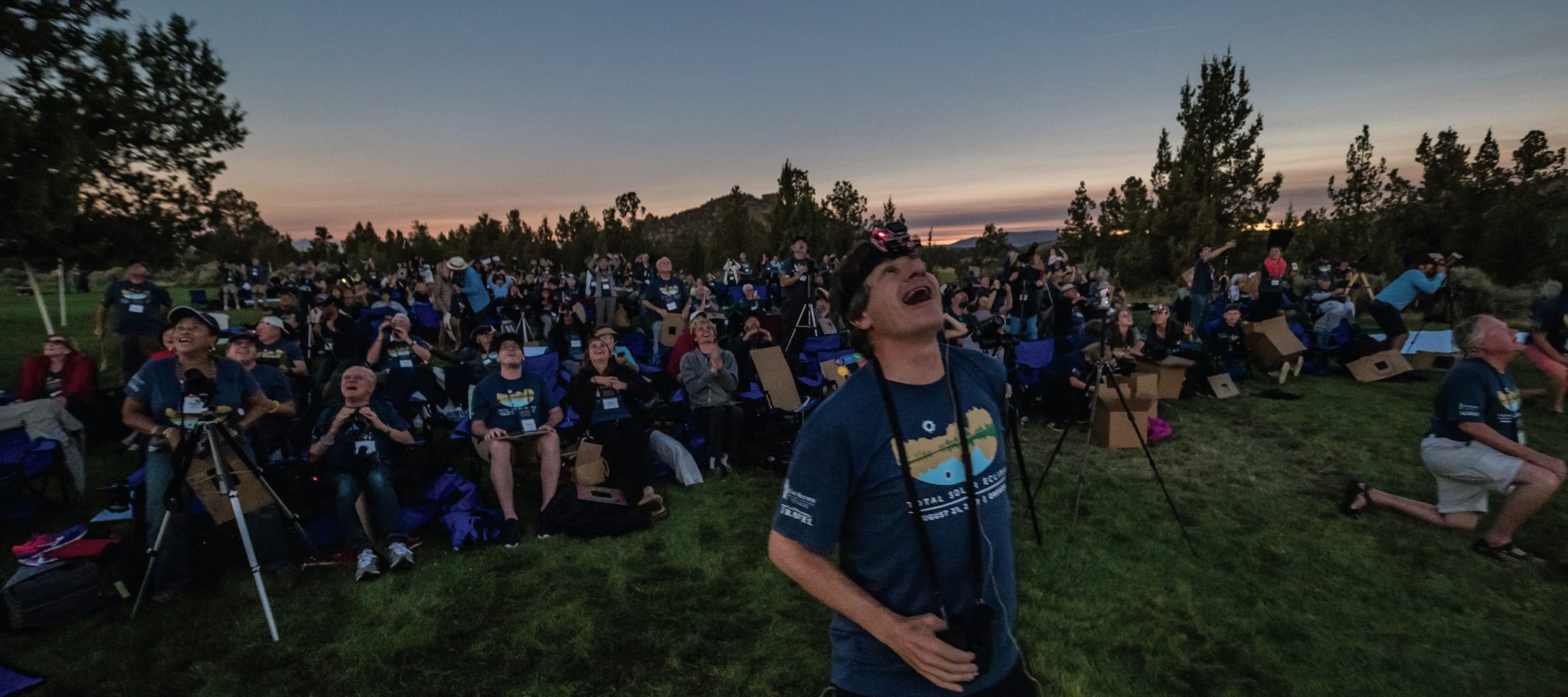 Alex Filippenko looking up at solar eclipse